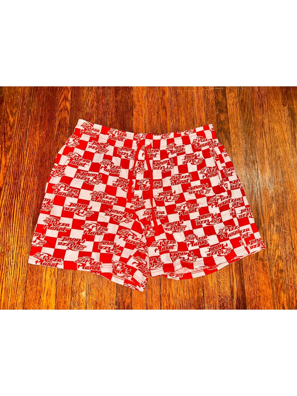 Men’s Large Disney's Pixar Toy Story Pizza Planet Checkered Lounge Shorts in Red